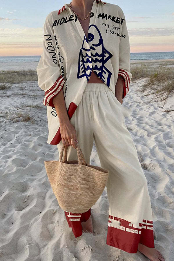 Rounelle™ | Elegantes Leinenkleid mit Druck von blauen Fischen