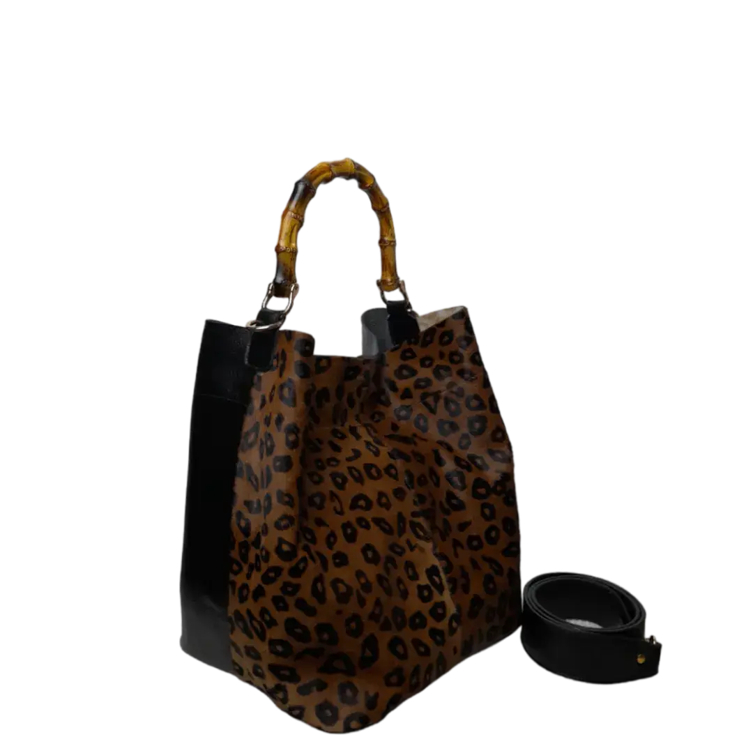 Claire Jaguar und schwarze Lederhandtasche für Frauen