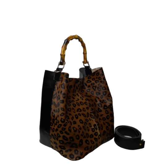 Claire Jaguar und schwarze Lederhandtasche für Frauen