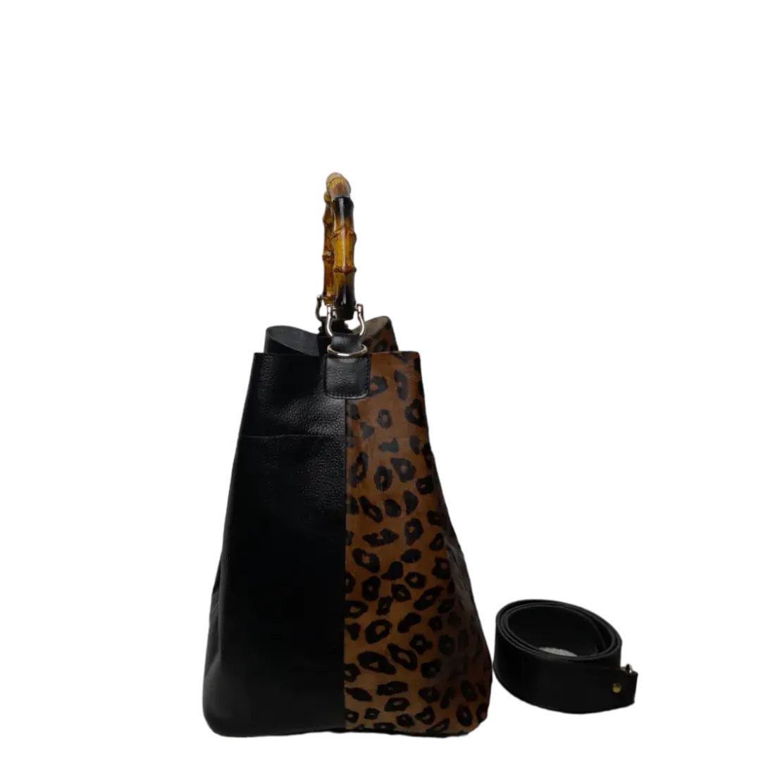Claire Jaguar und schwarze Lederhandtasche für Frauen