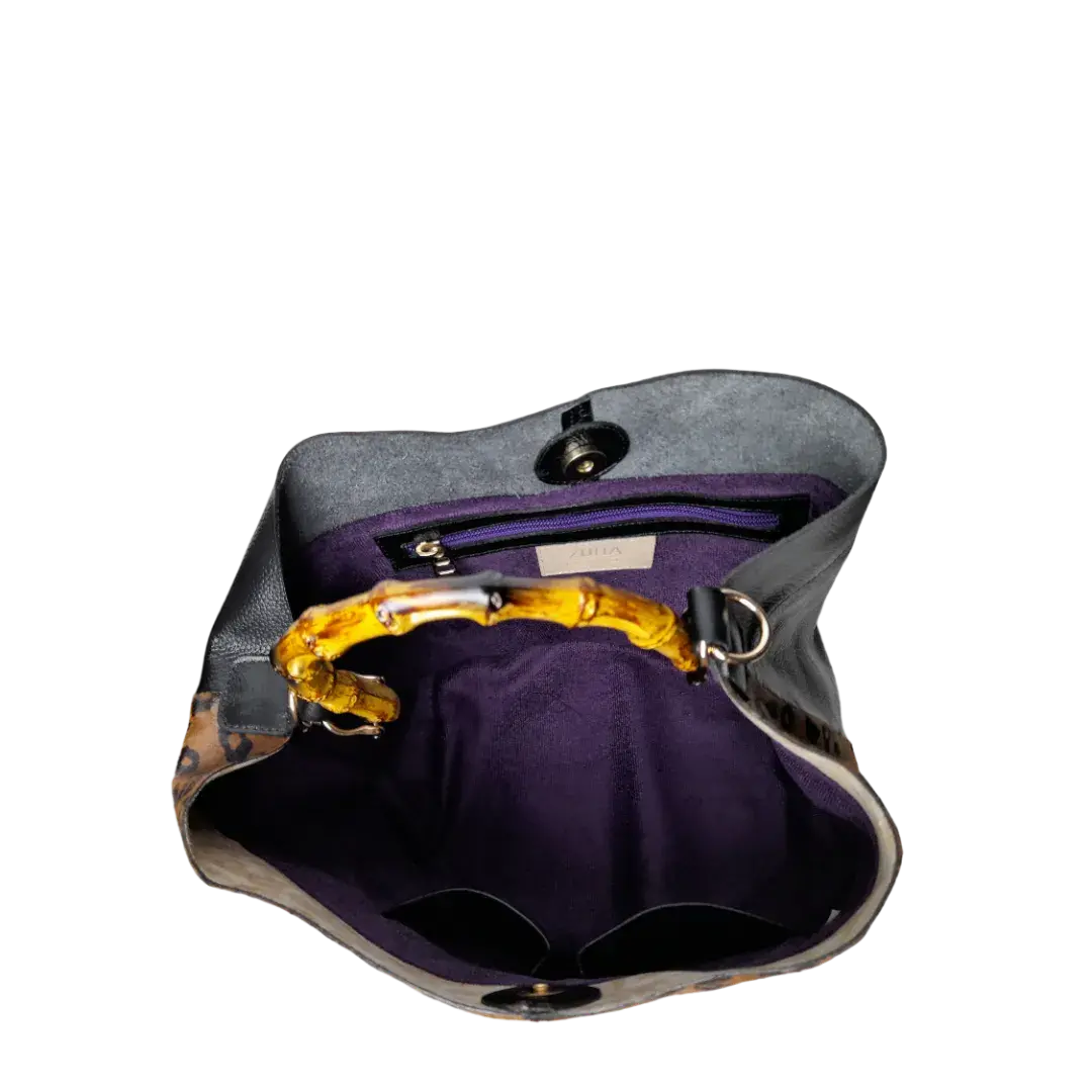 Claire Jaguar und schwarze Lederhandtasche für Frauen