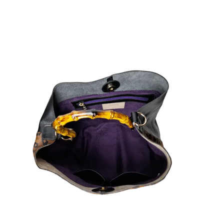 Claire Jaguar und schwarze Lederhandtasche für Frauen