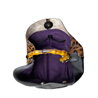 Claire Jaguar und schwarze Lederhandtasche für Frauen