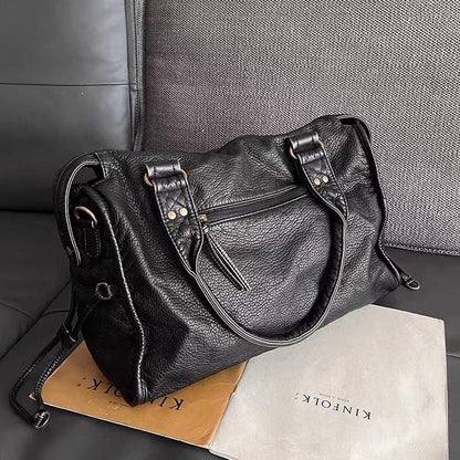 Elegante vintage schwarze Lederhandtasche